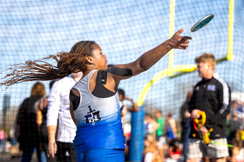 Students run in track and field